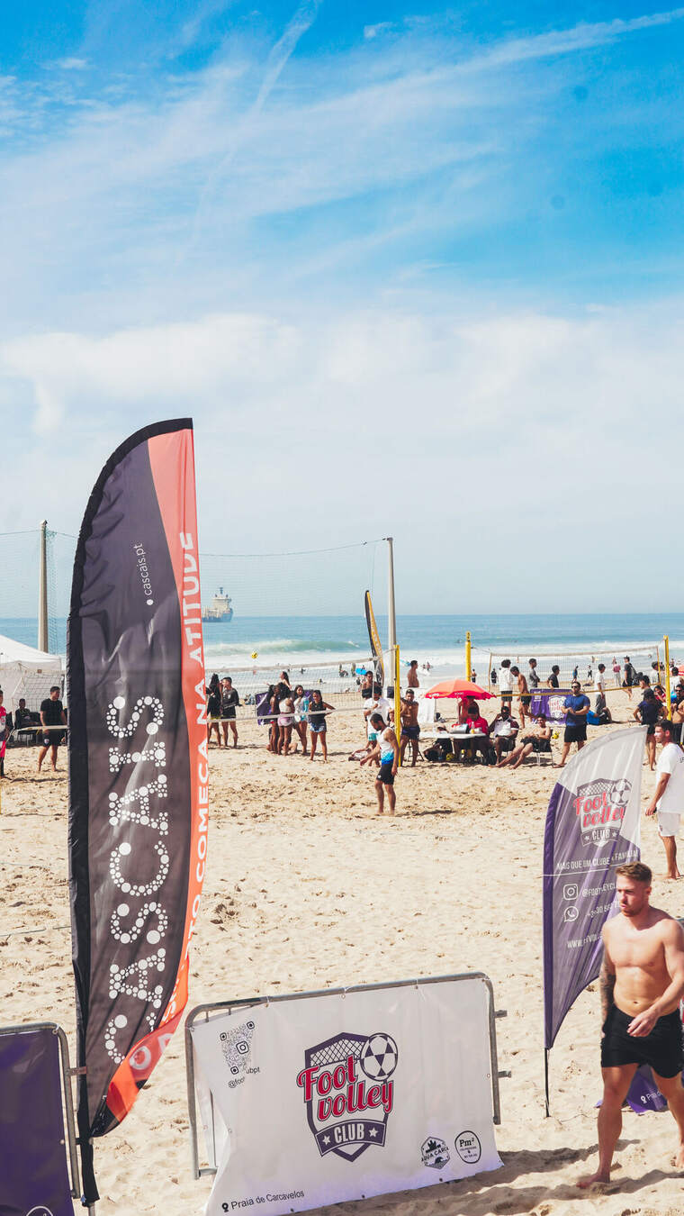 Footvolley Club banner on the beach