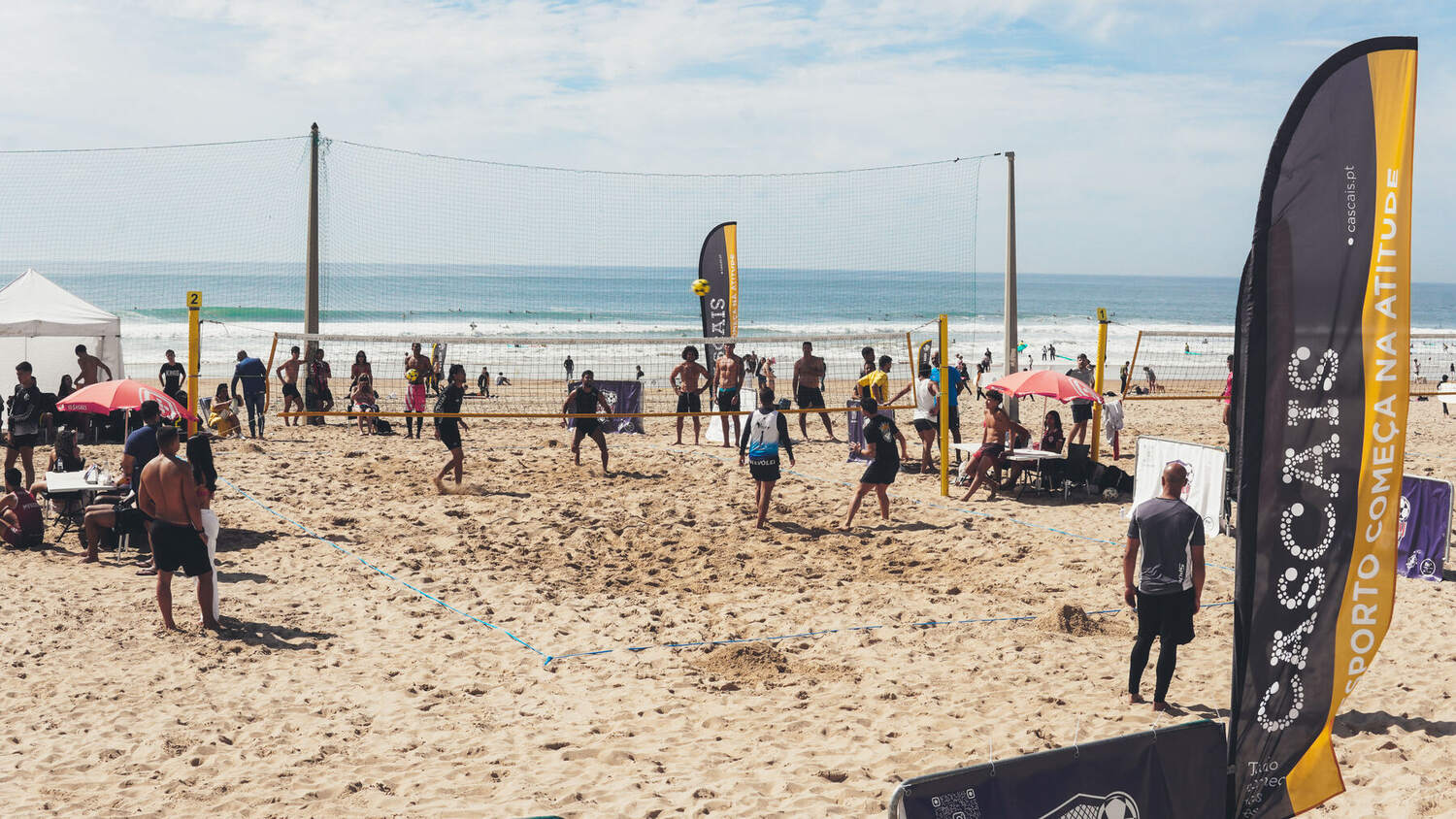 Footvolley courts and players on the beach
