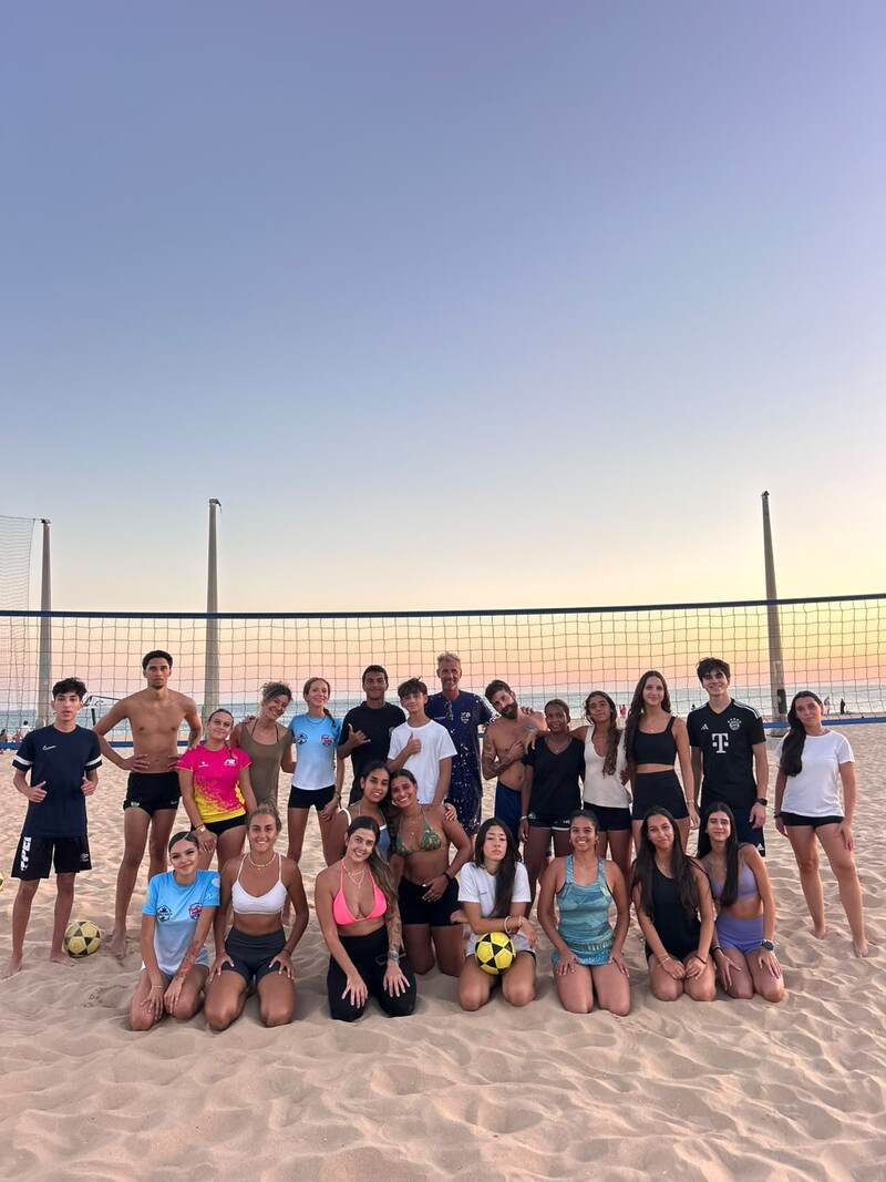 Erick Kretzu with a training group at sunset